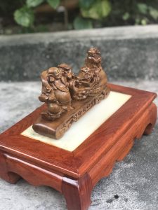 tượng di lặc kéo bao tiền